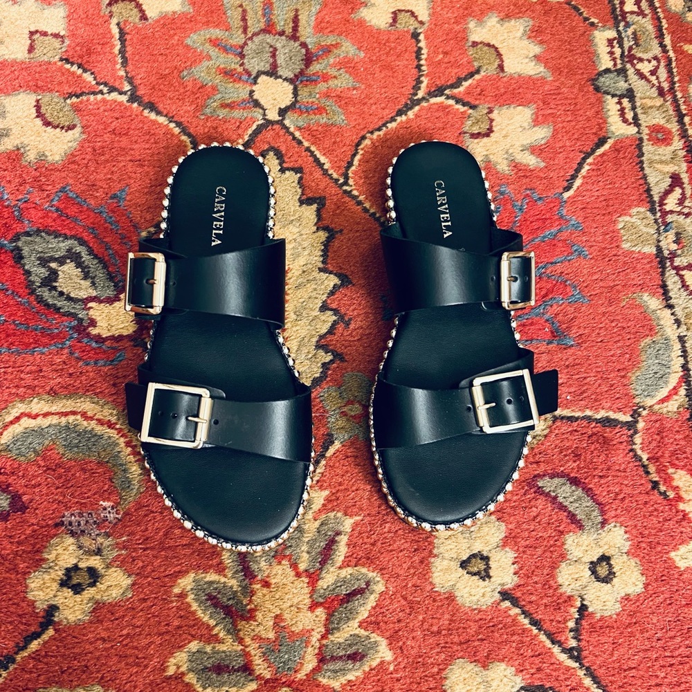 Carvela black leather mule, size 7.